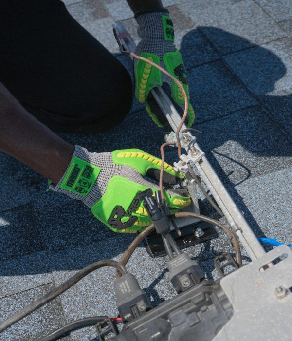 Electrical contractor installing circuit breaker in New York building